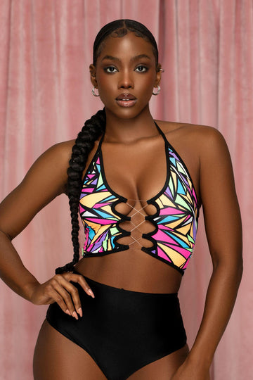 a woman in a colorful waitress bikini top